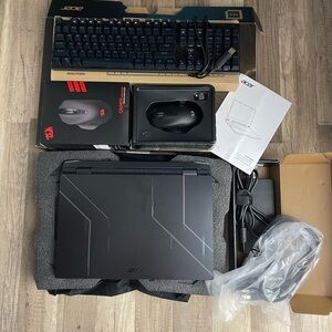 Acer Black Laptop with Gaming Accessories